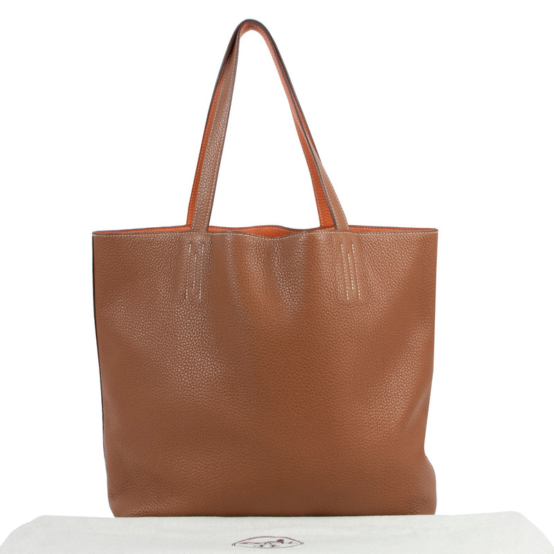 Buy an authentic second hand Hermès Double Sens 45 Indian Brown/ Orange Clemence Leather Tote Bag in very good condition at Labellov.