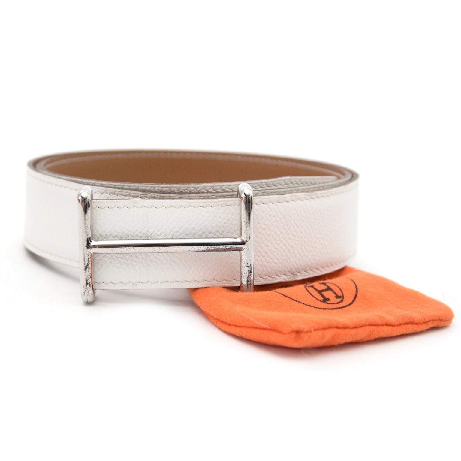 Bent u opzoek naar een Hermès Reversible White/Gold H Buckle PHW Belt?