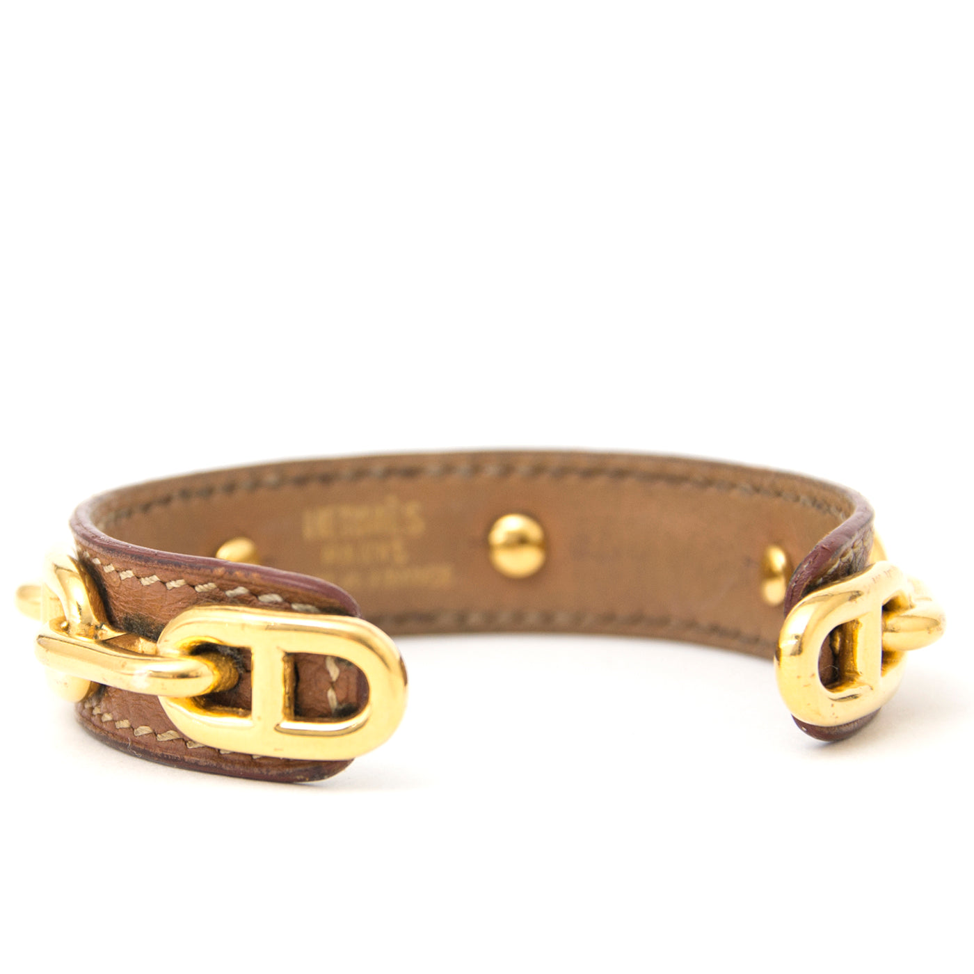 Buy authentic Hermès orange bracelet at the right price at LabelLOV vintage webshop. Luxe, vintage, fashion. Safe and secure online shopping. Antwerp, Belgium.
