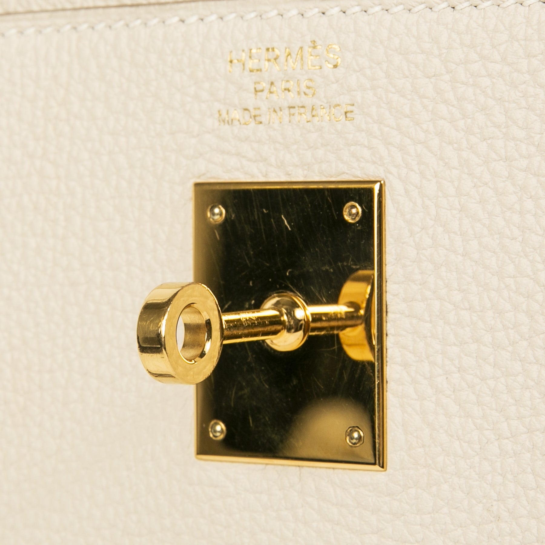 Buy and sell 100% authentic Hermès Kelly 35 Retourne Togo Craie GHW