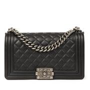 Chanel Black Medium Boy Bag for the best price at Labellov secondhand luxury in Antwerp