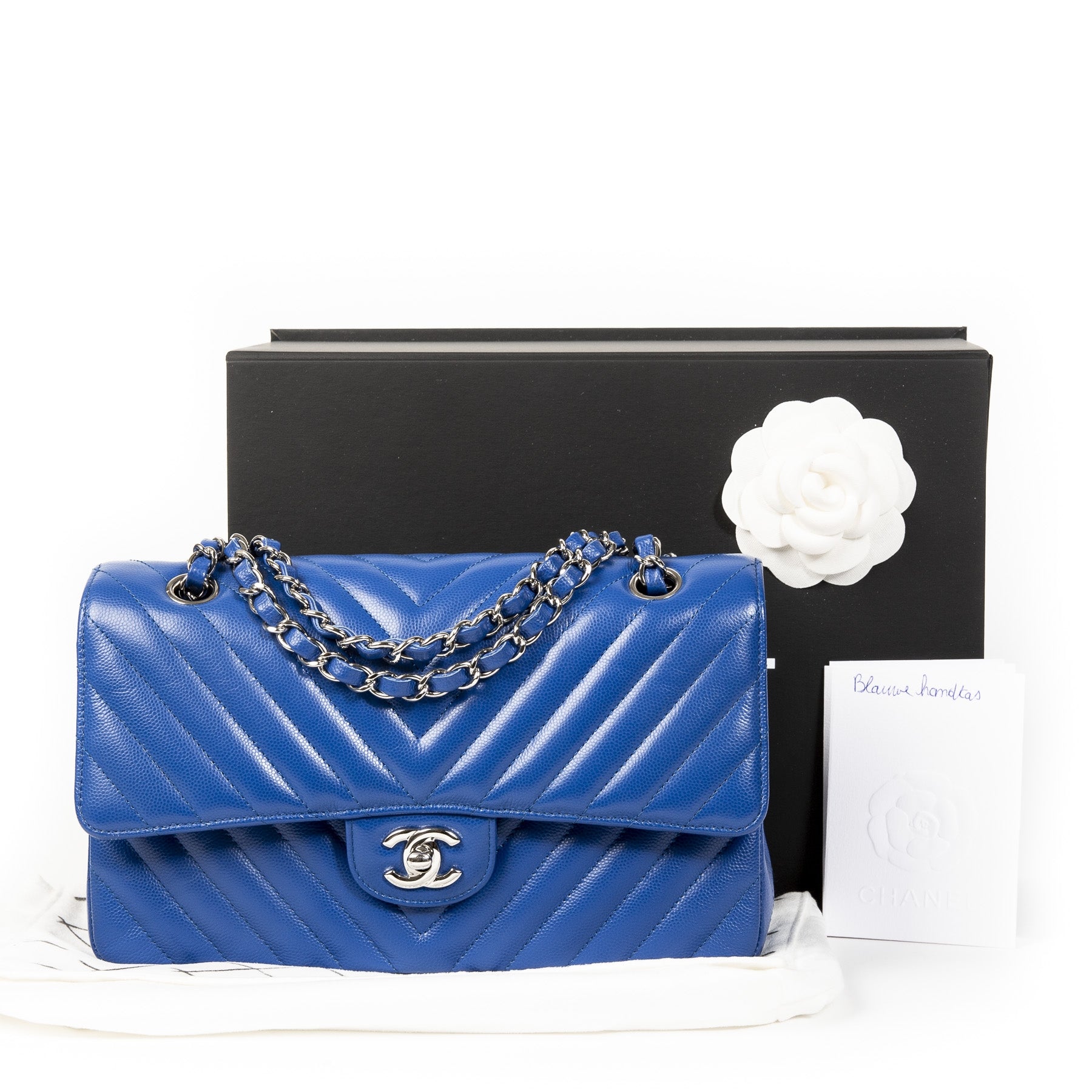 buy and sell your authentic Chanel Cobalt Blue Chevron Flap Bag Medium for the best price at Labellov secondhand luxury