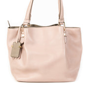 We buy and sell your authentic Tods Pink Mini Flower Shopping Bag