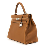 Hermès Kelly Retourne 32 Veau Togo PHW te koop online bij Labellov tweedehands luxe in Antwerpen