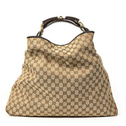 We buy and sell your authentic designer Gucci Monogram Shoulder Tote