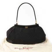 Salvatore Ferragamo Black Wool Knitted Shoulder Bag. Buy authentic Salvatore Ferragamo Bag at the right price at LabelLOV vintage webshop. Shop safe and secure online. Koop authentieke Salvatore Ferragamo tas aan de juiste prijs bij LabelLOV .