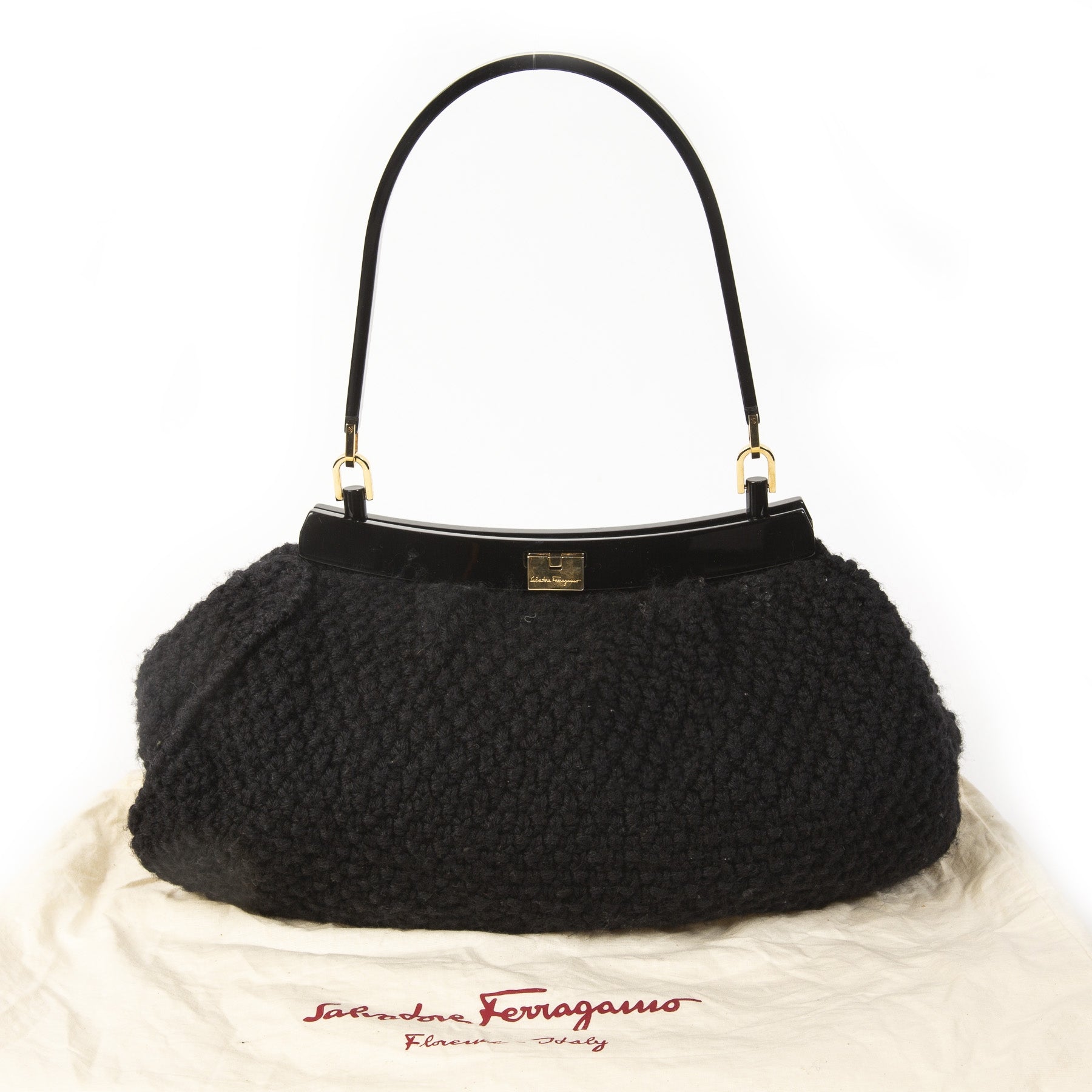 Salvatore Ferragamo Black Wool Knitted Shoulder Bag. Buy authentic Salvatore Ferragamo Bag at the right price at LabelLOV vintage webshop. Shop safe and secure online. Koop authentieke Salvatore Ferragamo tas aan de juiste prijs bij LabelLOV .