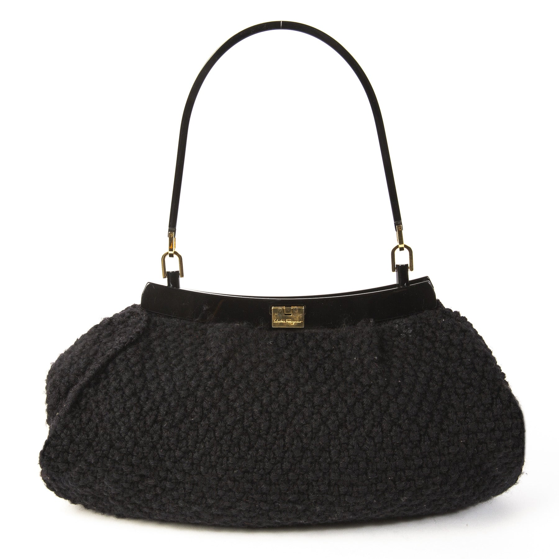 Salvatore Ferragamo Black Wool Knitted Shoulder Bag. Buy authentic Salvatore Ferragamo Bag at the right price at LabelLOV vintage webshop. Shop safe and secure online. Koop authentieke Salvatore Ferragamo tas aan de juiste prijs bij LabelLOV .