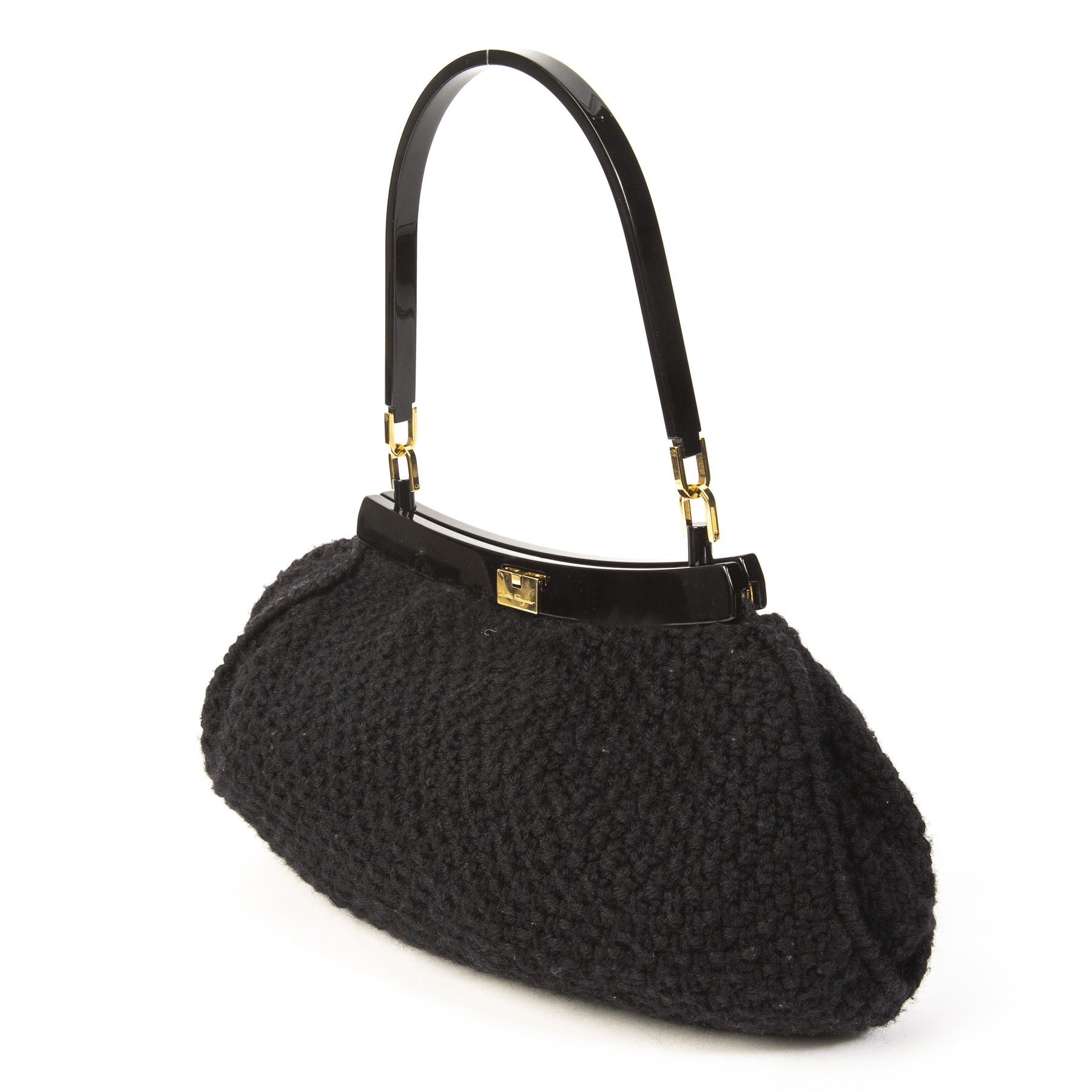 Salvatore Ferragamo Black Wool Knitted Shoulder Bag. Buy authentic Salvatore Ferragamo Bag at the right price at LabelLOV vintage webshop. Shop safe and secure online. Koop authentieke Salvatore Ferragamo tas aan de juiste prijs bij LabelLOV .
