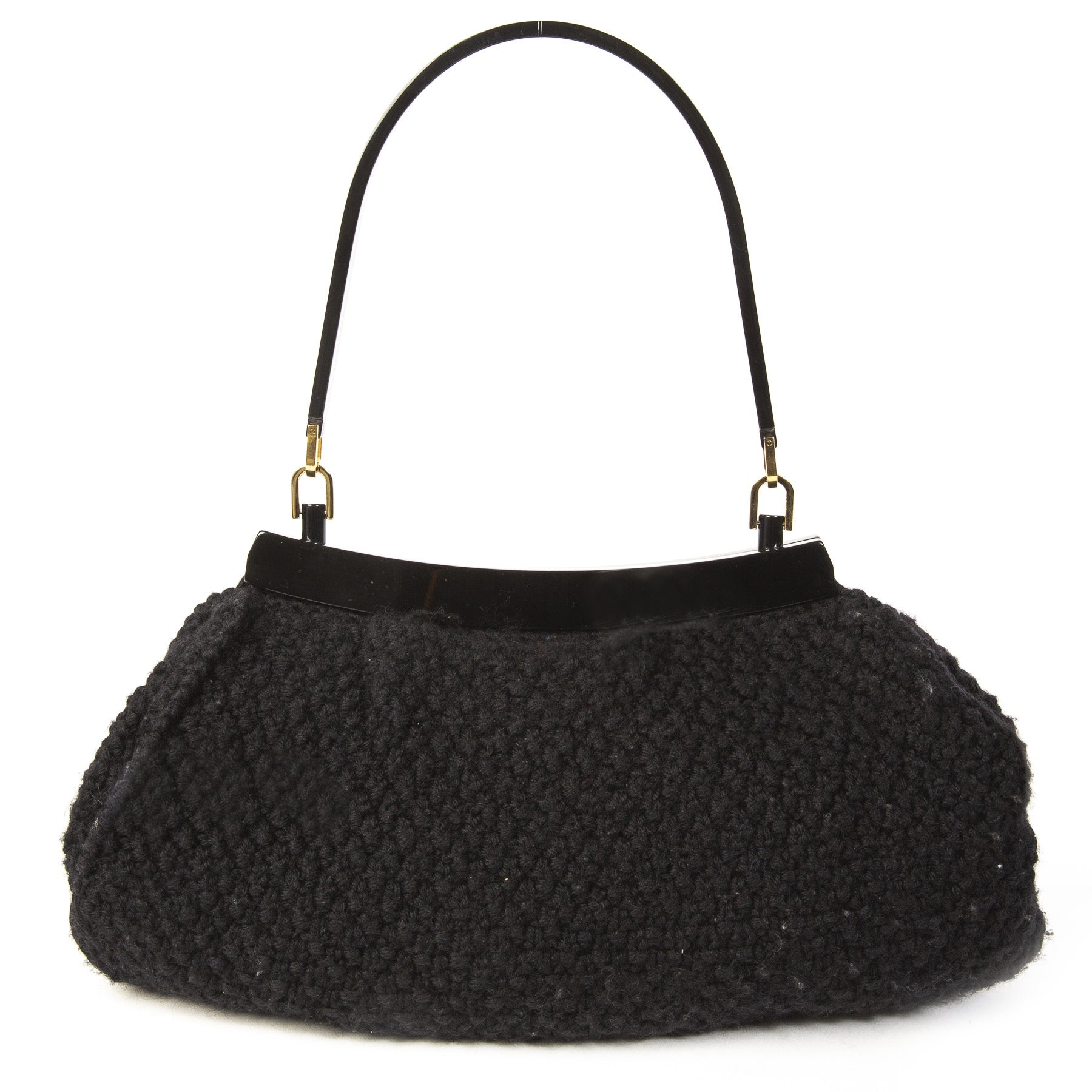 Salvatore Ferragamo Black Wool Knitted Shoulder Bag. Buy authentic Salvatore Ferragamo Bag at the right price at LabelLOV vintage webshop. Shop safe and secure online. Koop authentieke Salvatore Ferragamo tas aan de juiste prijs bij LabelLOV .