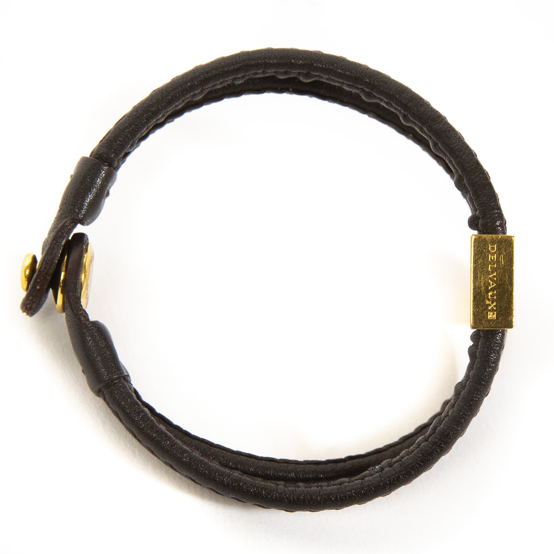 Delvaux Brown Déclic Bracelet. Buy authentic secondhand designer items from delvaux at labellov antwerp. Koop online tweedehands delvaux armband bij labellov antwerpen. veilige betaling, paiement sécurisé. Designer vintage.
