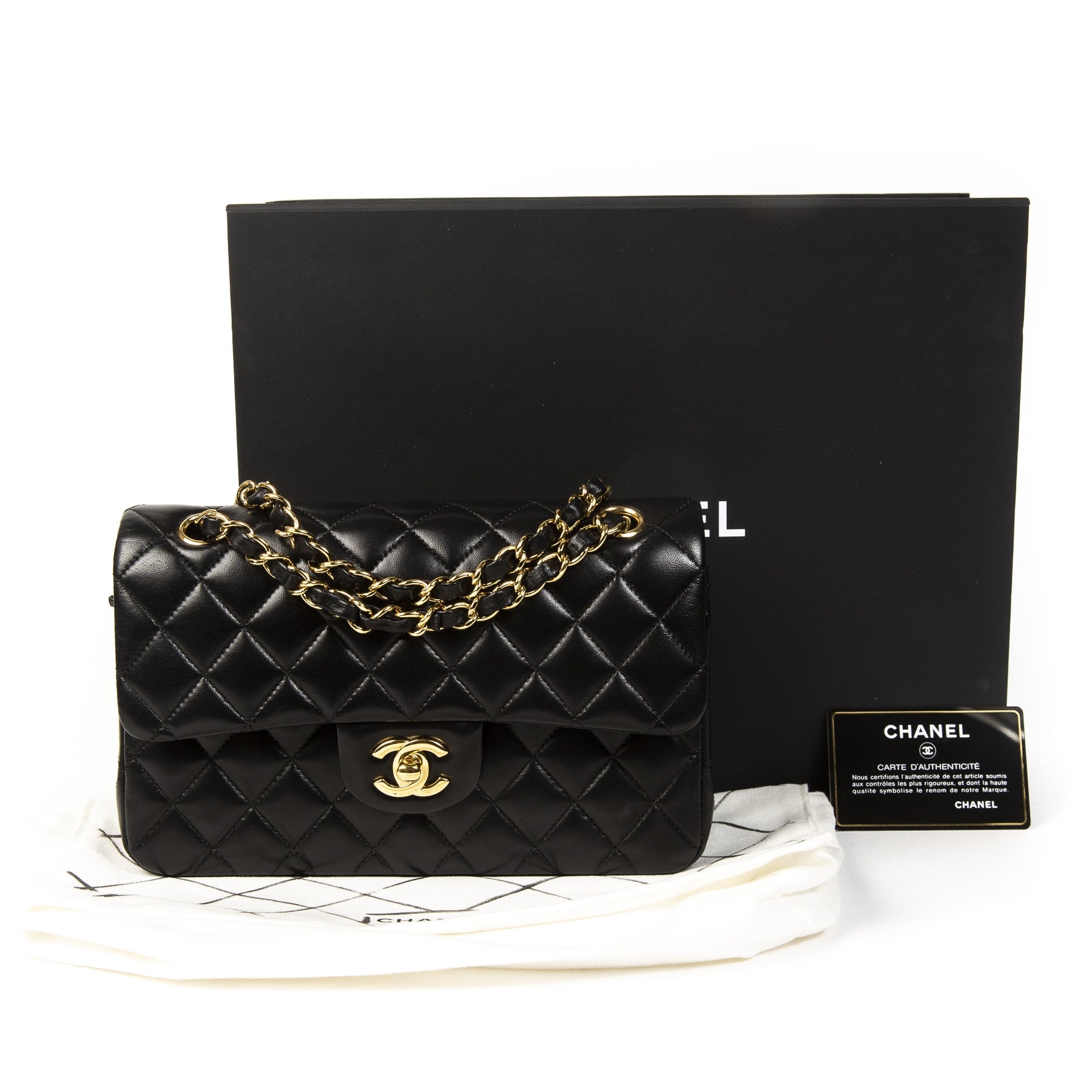 Chanel Small Black Classic Flap Bag GHW. Buy authentic secondhand chanel bag online at labellov antwerp, safe payment. Koop online tweedehands chanel classic flap bag bij labellov antwerpen, veilige betalinng. Designer vintage. Iconic chanel bag.