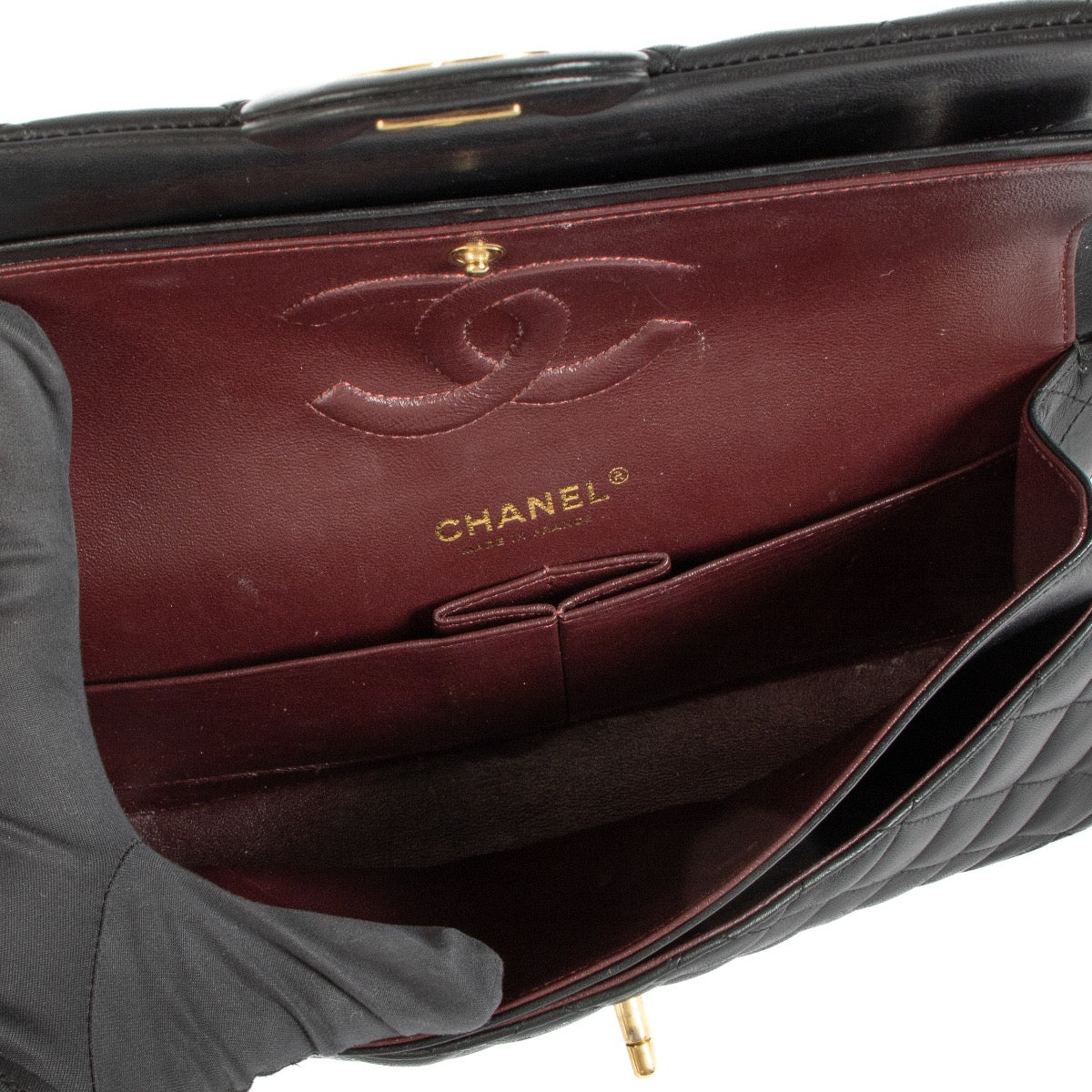 Shop 100% authentic second-hand Chanel Black Lambskin Medium Classic Flap Bag on Labellov.com