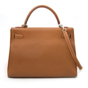 Hermès Kelly 32 togo gold phw now online at labellov.com authenticity guaranteed