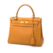 Next day delivery when you order a Hermès Kelly 28 Caramel Buffalo GHW