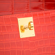 Hermès Kelly Cut Pochette Crocodile Porosus Lisse Orange GHW