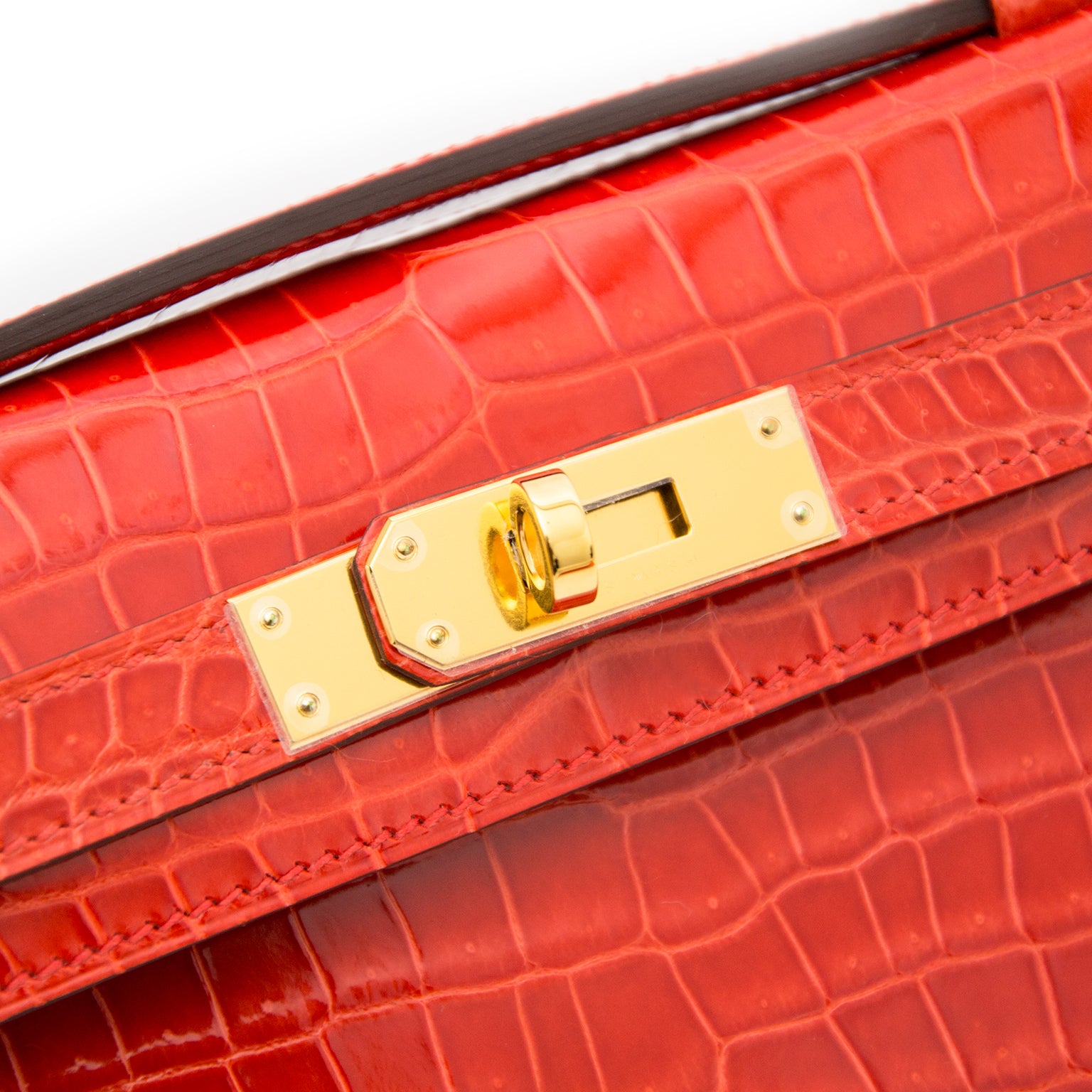 Hermès Kelly Cut Pochette Crocodile Porosus Lisse Orange GHW