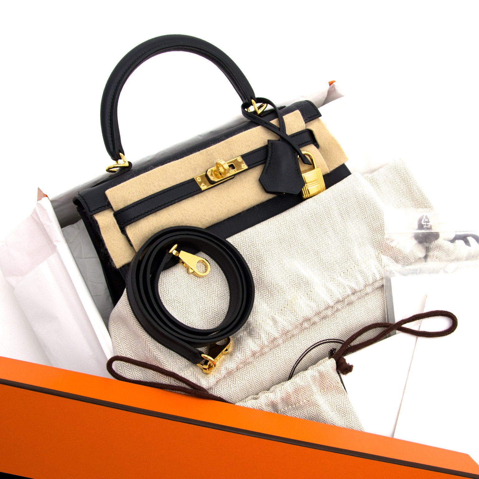shop your designer luxury Hermès Kelly 25cm Swift Blue Indigo GHW at the best price online