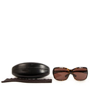 Shop safe online at Labellov in Antwerp, Brussels and Knokke these 100% authentic second hand Prada Tortoise Acetate Sunglasses