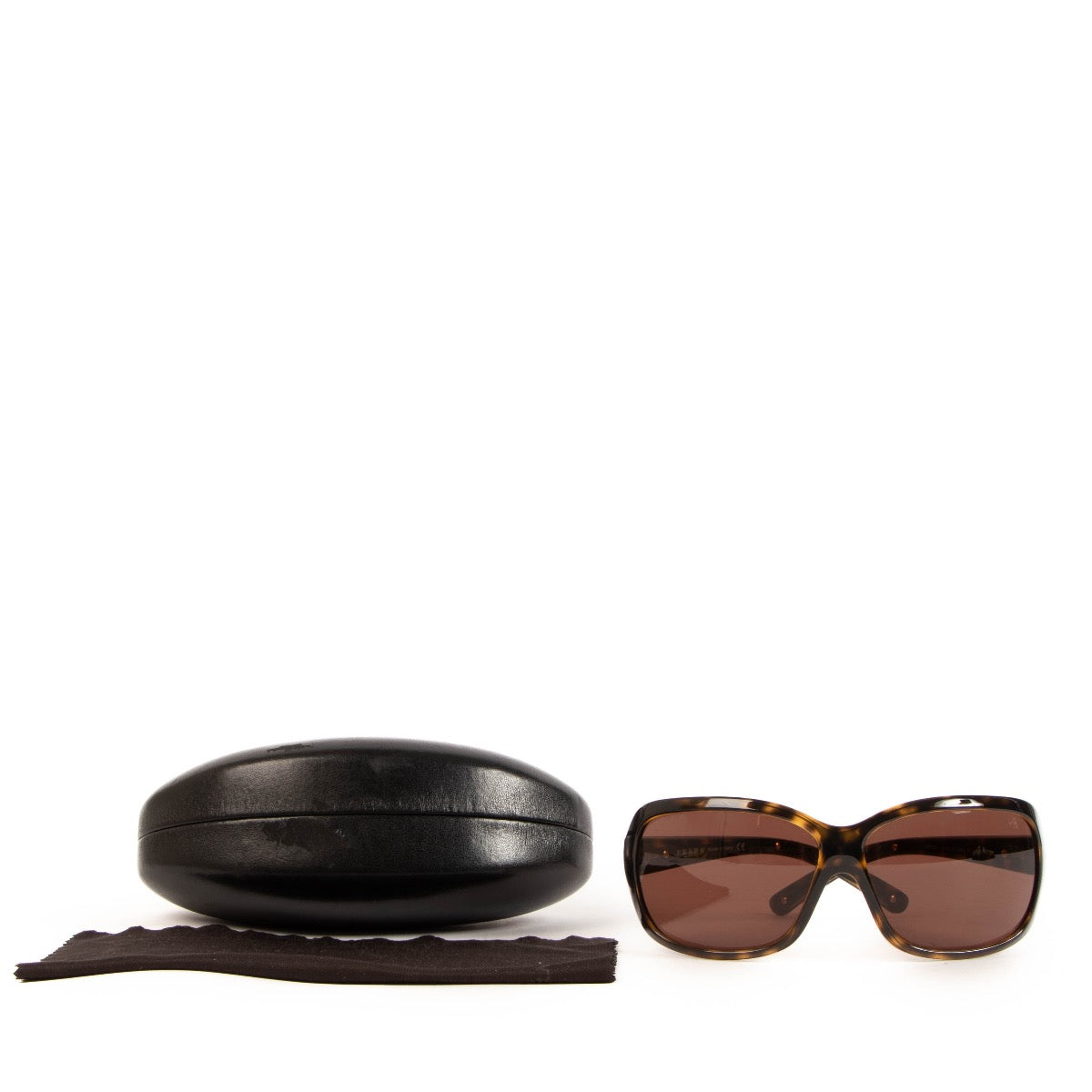 Shop safe online at Labellov in Antwerp, Brussels and Knokke these 100% authentic second hand Prada Tortoise Acetate Sunglasses