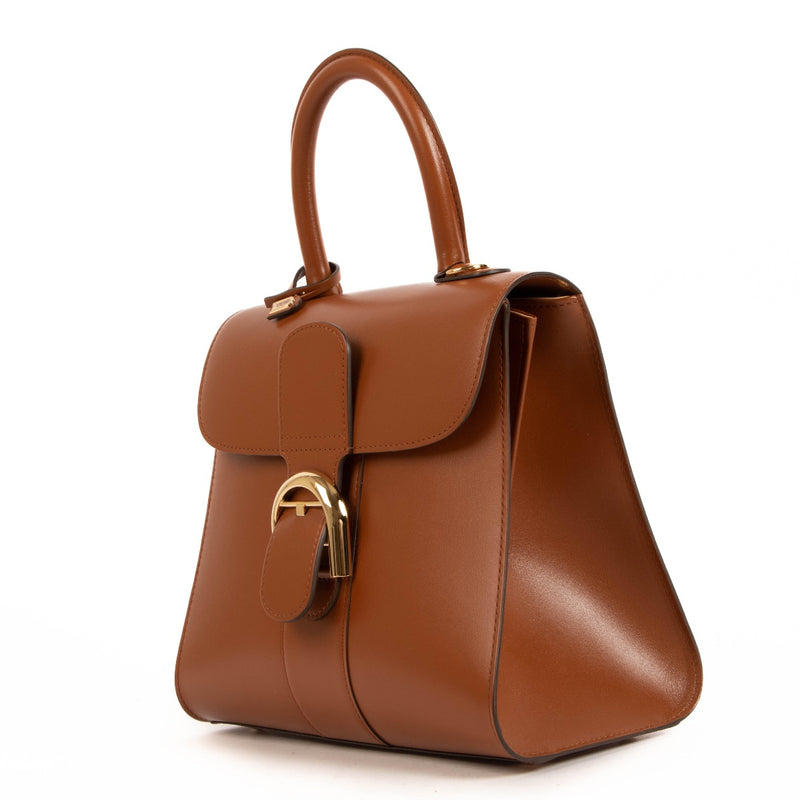 Buy an authentic Delvaux Brillant PM Brandy Box Calf in a brand new condition at Labellov in Antwerp.