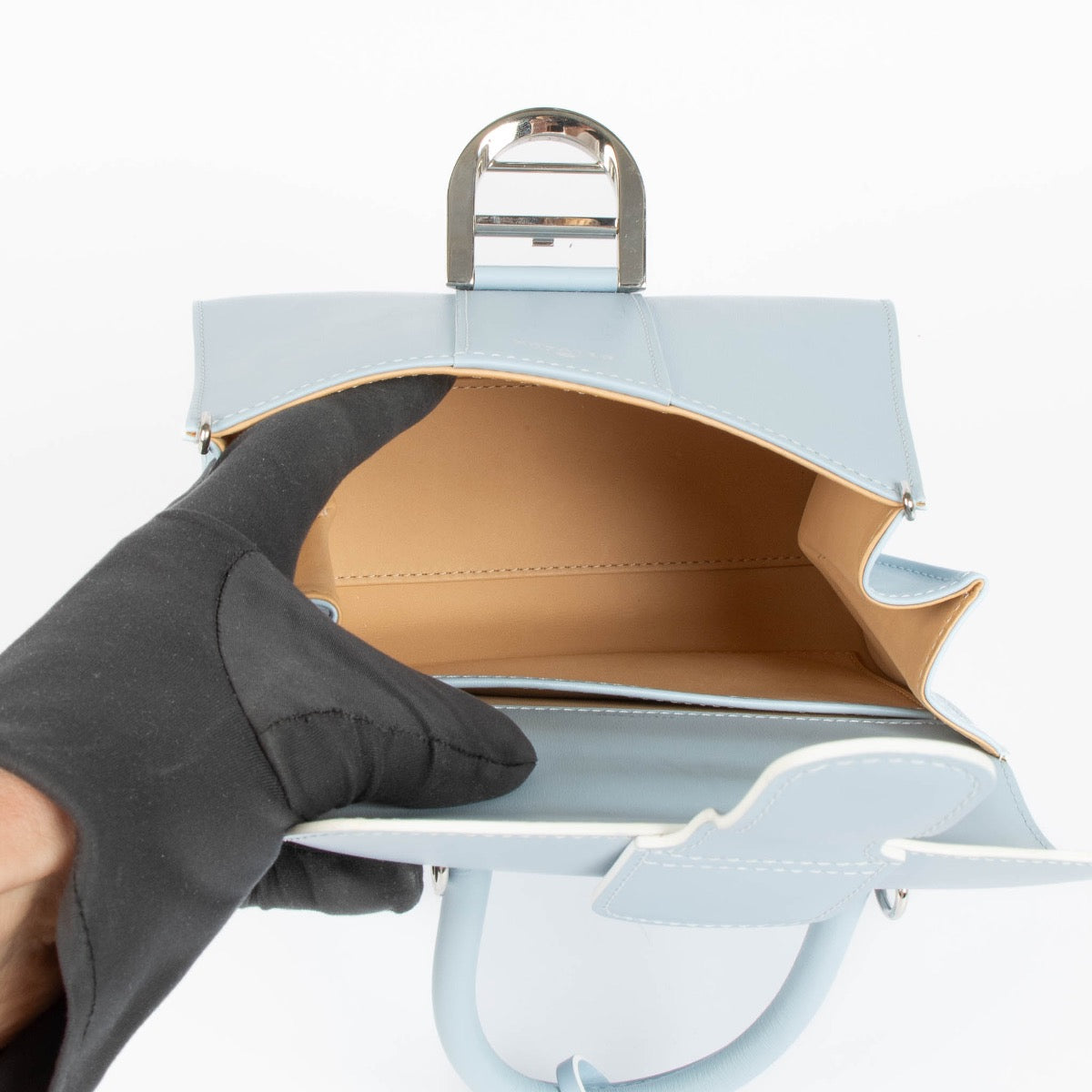 Shop safe online at Labellov in Antwerp, Brussels and knokke this 100% authentic second hand Delvaux Baby Blue Box Calf Mini Brillant