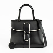 Shop authentic Delvaux Black/Ivory Illusion Brillant MM handbag on Labellov.com.