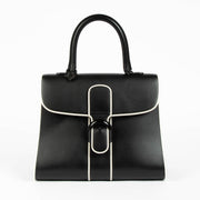 Shop authentic Delvaux Black/Ivory Illusion Brillant MM handbag on Labellov.com.