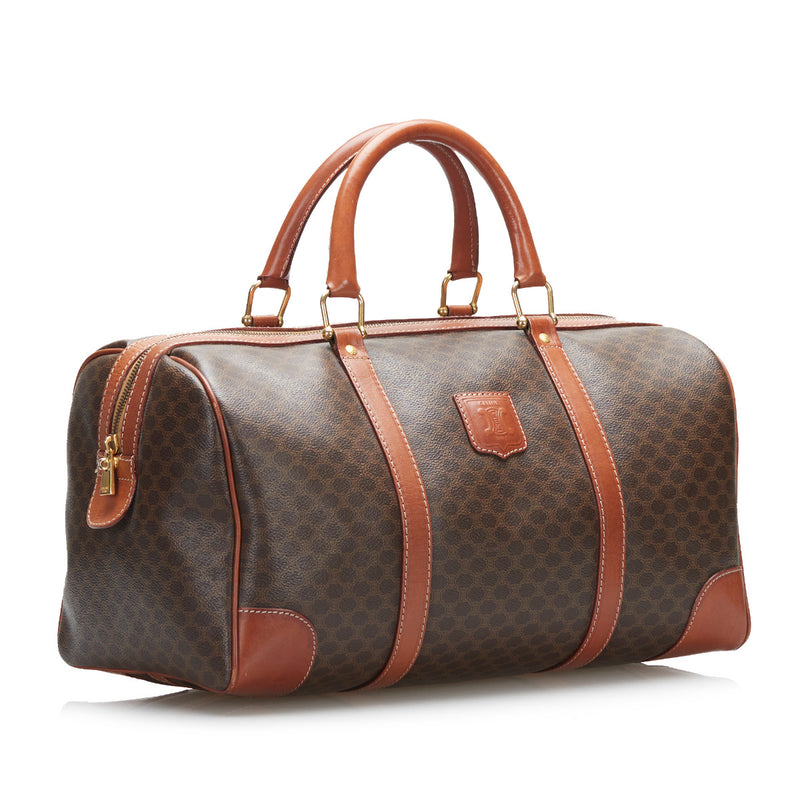 Celine Macadam Canvas Boston Travel Bag for the best price at Labellov secondhand luxury in Antwerp. We buy and sell your preloved designer bags for the best price.