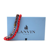 Lanvin Red & Taupe Bead Ribbon Necklace Buy authentic designer Lanvin secondhand Necklace at Labellov at the best price. Safe and secure shopping. Koop tweedehands authentieke Lanvin halsketting bij designer webwinkel labellov.