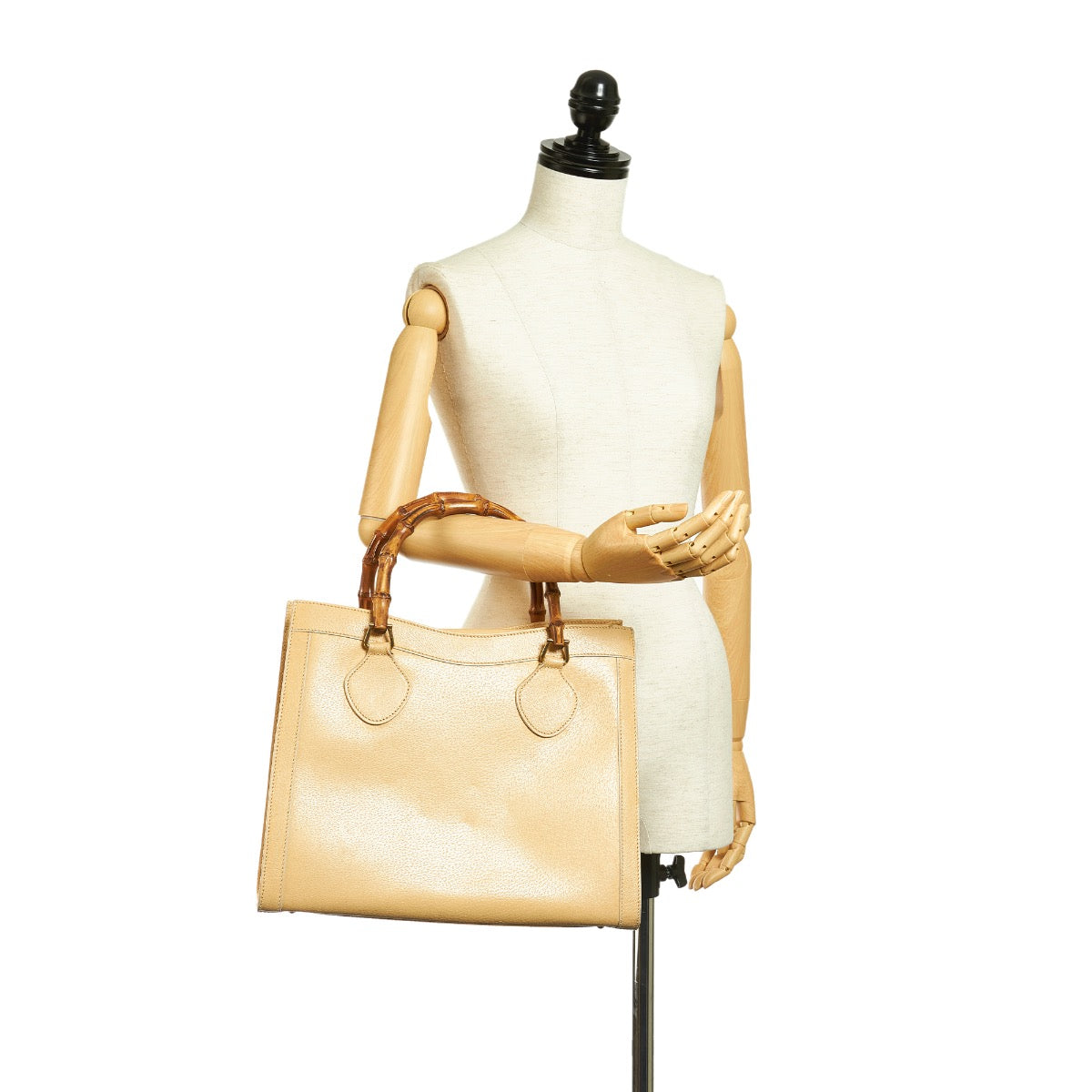 Buy an authentic second hand Gucci Vintage Cream Diana Bamboo Leather Top Handle in very good condition at Labellov