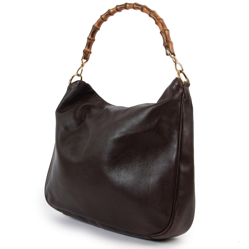 Buy an authentic second hand Gucci Brown Leather Bamboo Top Handle in very good pre-loved condition at Labellov