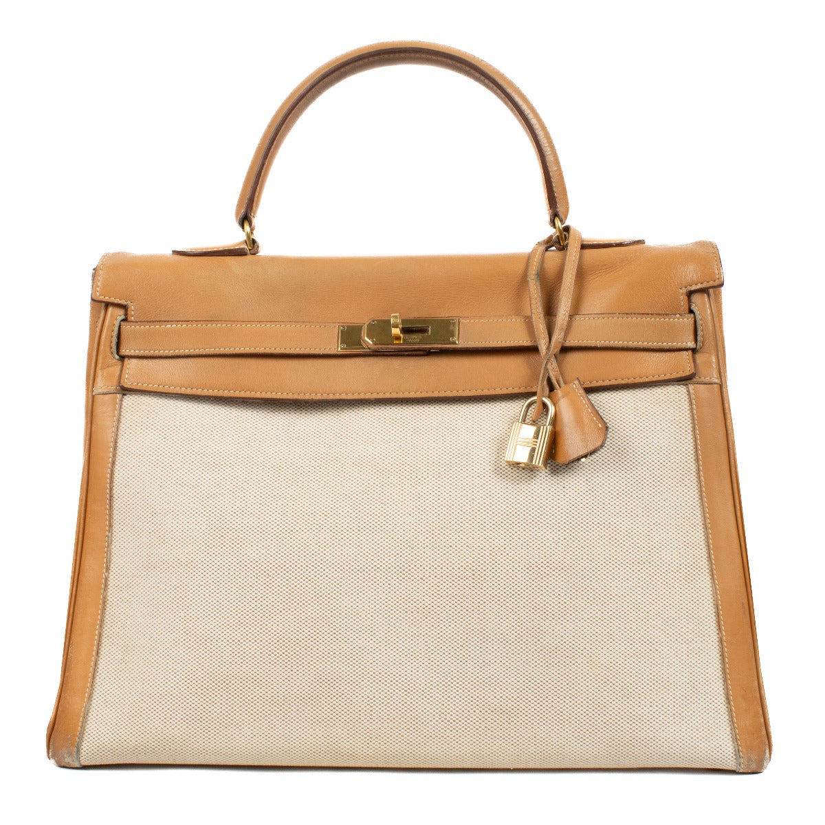 Shop authentic second hand Hermès Vintage Kelly 35 Toile H/Natural Leather GHW on www.labellov.com