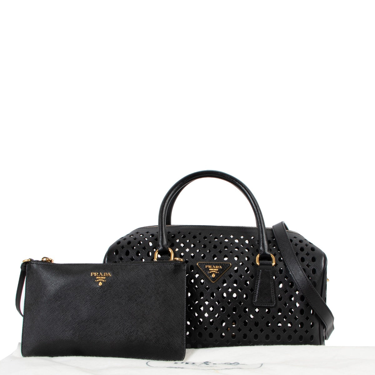 Shop now for your pre-loved, 100% authentic Prada Black Leather Saffiano Perforated Boston Bag, at Labellov in Antwerp.