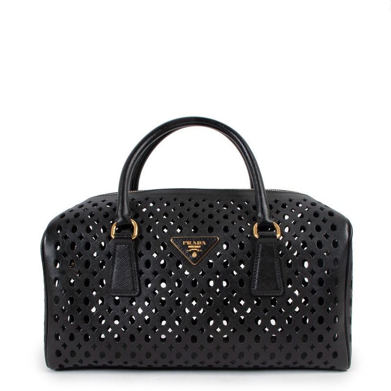 Shop now for your pre-loved, 100% authentic Prada Black Leather Saffiano Perforated Boston Bag, at Labellov in Antwerp.