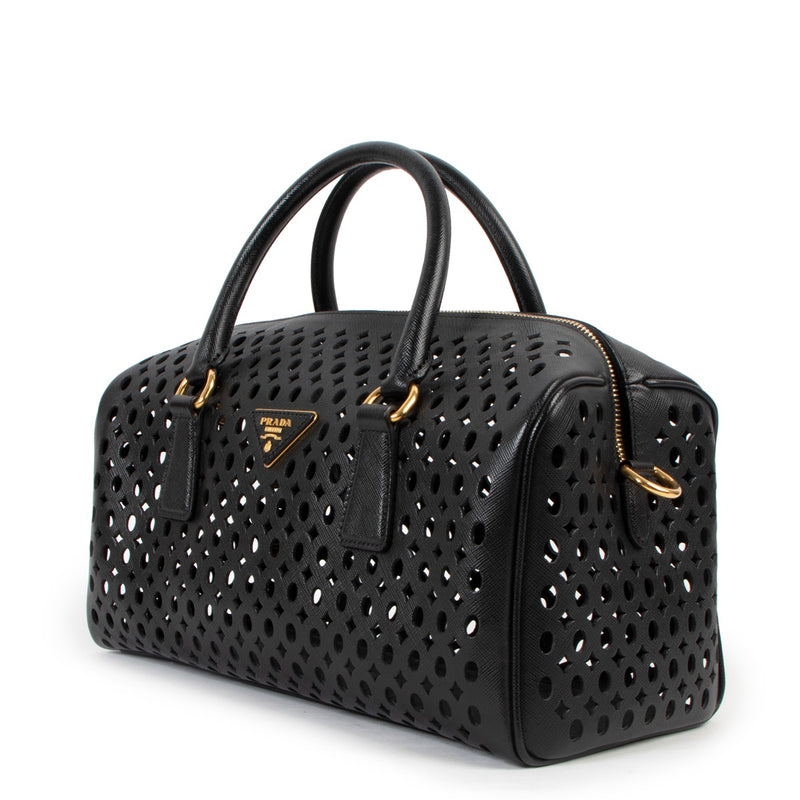 Shop now for your pre-loved, 100% authentic Prada Black Leather Saffiano Perforated Boston Bag, at Labellov in Antwerp.