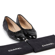 Veilig online kopen van tweedehands zwarte Chanel ballerina's in maat 41.