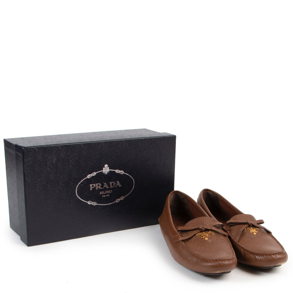 Veilig online kopen van authentieke bruine Prada schoenen aan de juist prijs in maat 41.