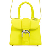 Delvaux Neon Yellow Mini Brillant + Strap for the best price at Labellov secondhand luxury in Antwerp. We buy and sell your authentic