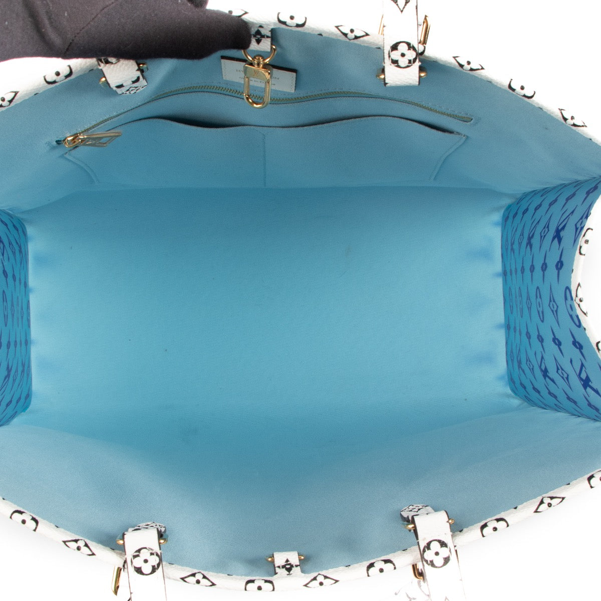 Shop safe online at Labellov in Antwerp, Brussels and Knokke this 100% authentic second hand Louis Vuitton Blue Monogram Limited Edition Knokke Onthego