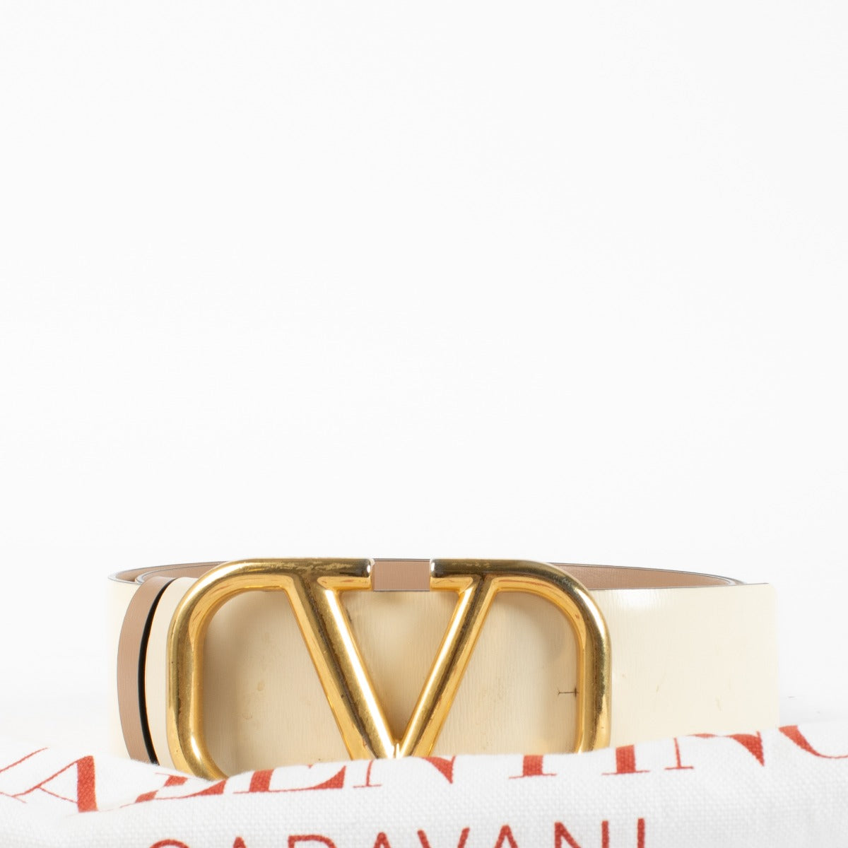 Authentic preloved Valentino Garavani Cream/ Reversible Vlogo Signature 40mm Belt - Size 85 on Labellov.com