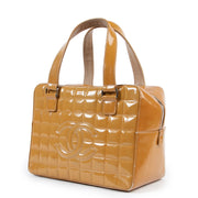 Shop safe online 100% authentic second hand Chanel Mustard Pantent Leather Top Handle Bag in very good condition at the right price at Labellov in Antwerp.
