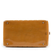 Shop safe online 100% authentic second hand Chanel Mustard Pantent Leather Top Handle Bag in very good condition at the right price at Labellov in Antwerp.