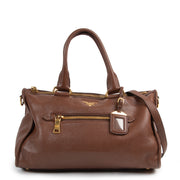 Shop safe online this brown Prada shoulder bag.