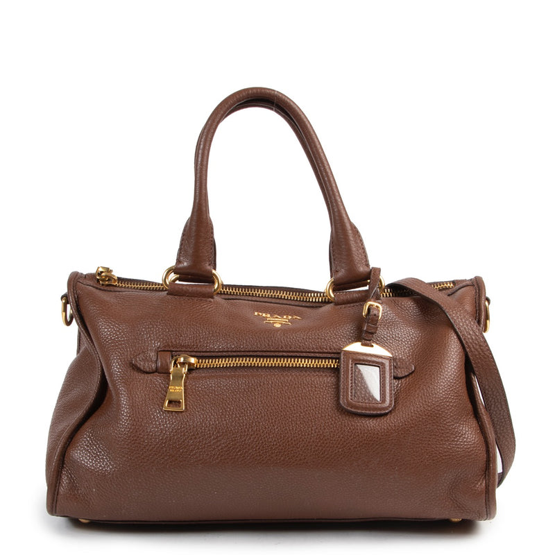 Shop safe online this brown Prada shoulder bag.
