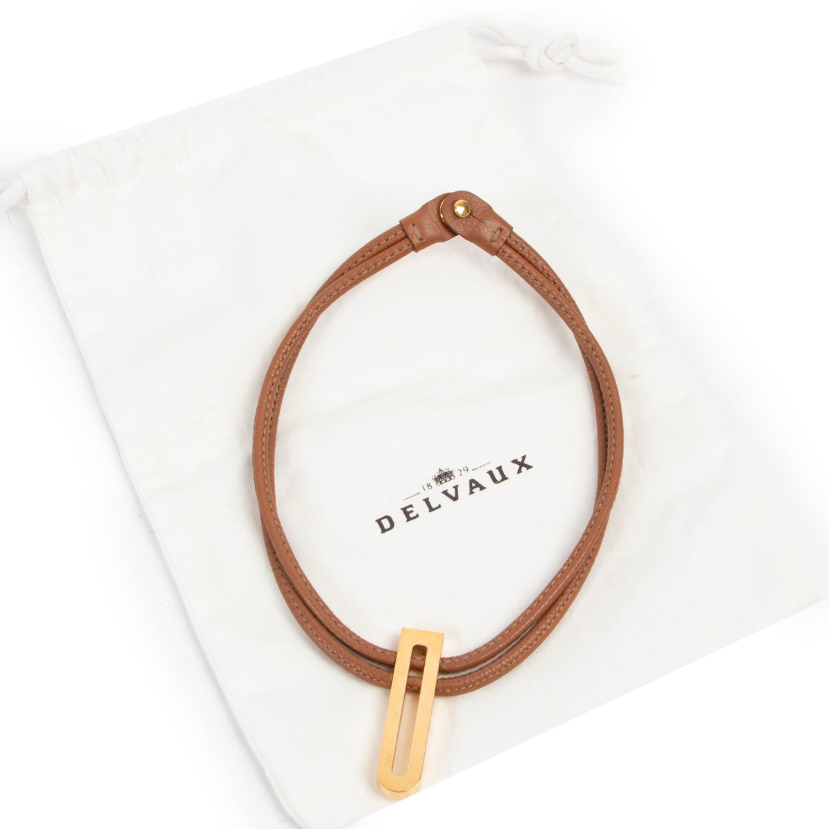 Original vintage Delvaux Cognac Leather Necklace in good condition now for sale on Labellov website for 2nd hand designer goods
