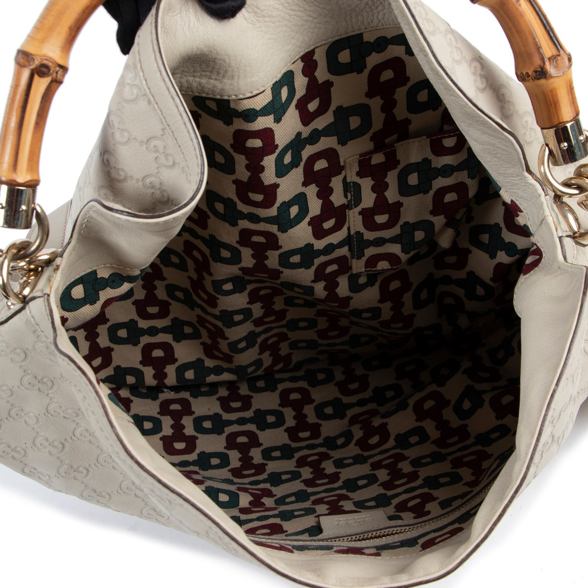 Get this Gucci Ivory Guccissima Peggy Bamboo Bag at Labellov online or in store at the Verlatstraat Antwerp in very good condition