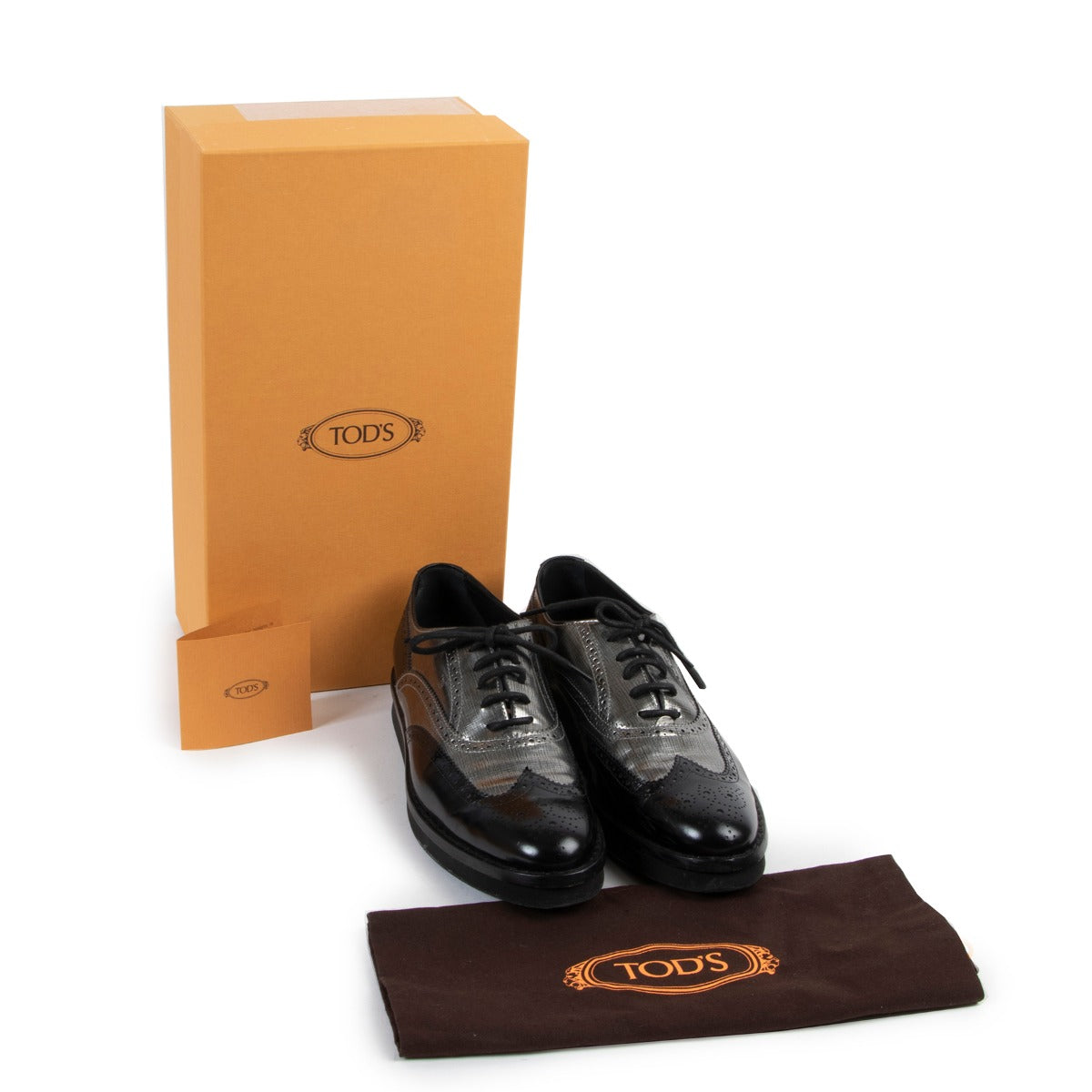 Buy these Tods Black Silvaer Leather Flats - Size 40,5 at Labellov online or in store.