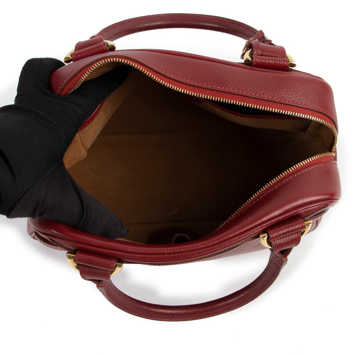 Delvaux Red Top Handle Trotteur at Labellov online or in store available for a reasonable price and in good condition. Get them now!