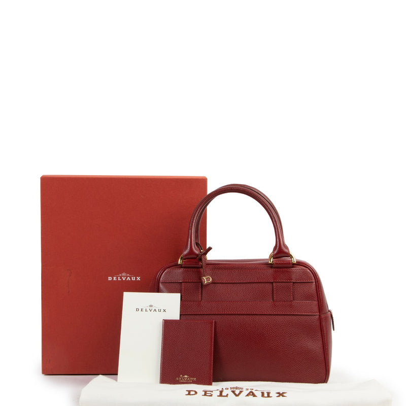 Delvaux Red Top Handle Trotteur at Labellov online or in store available for a reasonable price and in good condition. Get them now!